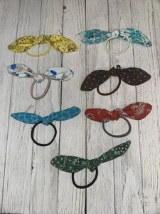 LOT OF 7 HAIR TIES WITH SMALL BOWS, HAIR ACCESSORIES, VARIOUS PRINTS - Picture 1 of 8