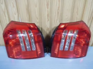 Toyota Corolla Runx NZE121 124 Tail Lights Rear Lamps Left Right set Genuine - Picture 1 of 8