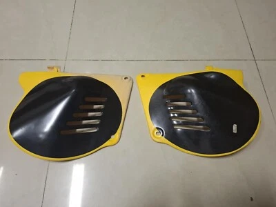 SUZUKI RM100-RM125-PE175 FRAME SIDE COVER YELLOW L-R NOS 47111&47211-41301-019 - Image 1 of 4