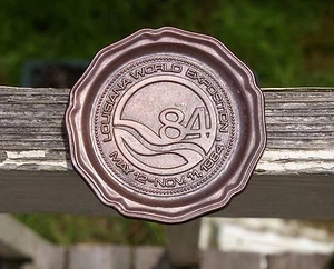 Louisiana Weltausstellung 84 12. Mai - 11. November 1984 Metalluntersetzer - Bild 1 von 3