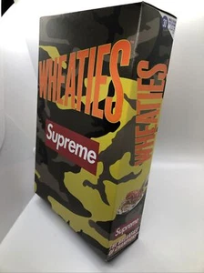 NUEVO SELLADO Supreme Wheaties Caja de Cereales S/S 2021 Amarillo Verde Camuflaje 100% Auténtico - Imagen 1 de 1