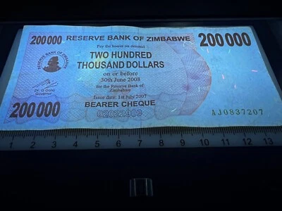 Billete de cheque portador de 200000 dólares de Zimbabue - Serie anterior a mil millones Foto 1 de 3