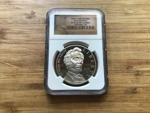 Dólar de plata conmemorativo del bicentenario Lincoln 2009 P como nuevo $1 PF 69 NGC - Imagen 1 de 8