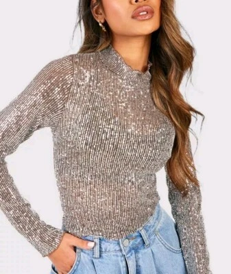 Top manga larga cuello alto lentejuelas, talla 8  Foto 1 de 4