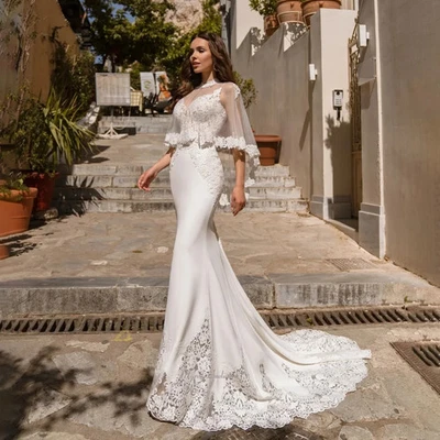 Vestido de novia sin espalda elegante cuello en V correa de espagueti apliques de encaje vestido de novia Foto 1 de 4