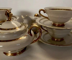Juego de té vintage con patas Upsala Ekeby Suecia ~ 4 tazas y platillos, azucarero, crema - Imagen 1 de 13