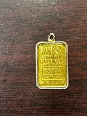 Barra de oro de 2,5 gramos Johnson Matthey JM colgante logotipo JM reverso Foto 1 de 3