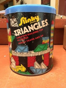 Slinky Brand Triangles In Container James Industries Vintage Toy 57 Pieces EUC - Picture 1 of 7