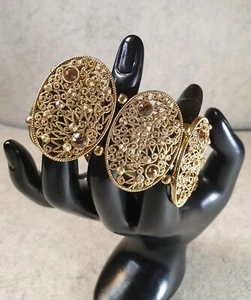 Metal G/tone Filagree Stretch Clear & Topaz Rhinestone Bracelet; Starburst Swirl - Picture 1 of 7