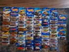 Hot Wheels Case 72 cars from Various Years & 2 Treasure Hunts