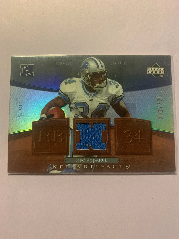 A6524 - 2007 Artifacts AFC/NFC Apparel #KJ Kevin Jones Jersey/325 - Image 1 of 1
