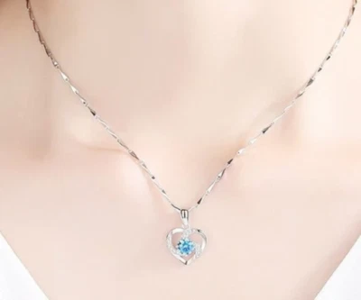 CATENINA IN RAME COLOR ARGENTO CON CIONDOLO CUORE E ZIRCONI AZZURRO PER DONNA - Immagine 1 di 2