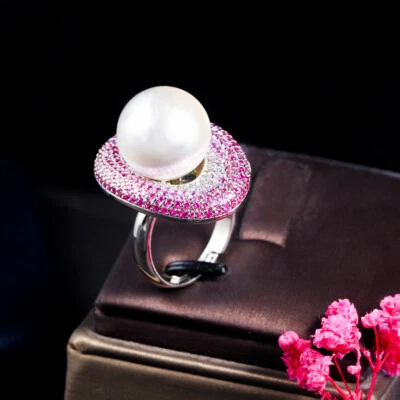 Anillo de dedo banda de boda grande ovalada brillante circonita cúbica rosa brillante tamaño redimensionable Foto 1 de 4