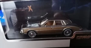 Premium X 1/43 Cadillac Seville Elegance 1980 marrón/oro embalaje original lim. Ed. 750 piezas - Imagen 1 de 8