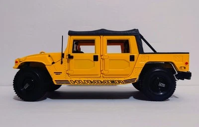 Maisto Special Edition Hummer Soft Top Yellow & Black 1:18 Diecast - Image 1 of 4