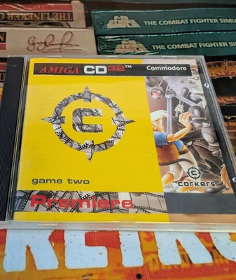 Premiere (Corkers) Commodore Amiga CD 32 (CD-Rom, Manual Case) works 32-bit - Bild 1 von 3