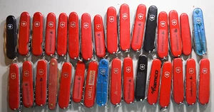 32 Lot Victorinox/Wenger Swiss Army knives- mixed models/ages/conditions #L115 - Picture 1 of 9