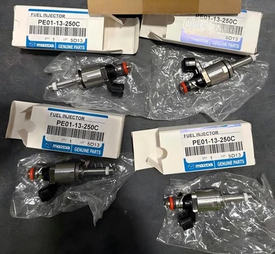 4Pcs Genuine Mazda PE01-13-250D Fuel Injector 2.0L 2012-2018 3 CX-3 MX-5 CX-5 Foto 1 de 4