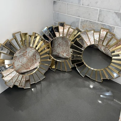 Three Gold Style Plastic Sunburst Wall Hanging Accent Mirrors. - Image 1 of 4