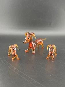 Statuine in vetro ambrato soffiato a mano bassotto piangente cane mamma e 2 cuccioli - Foto 1 di 12