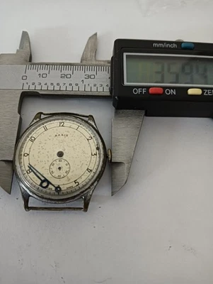 Reloj Pulsera Estilo Militar Base Años 49 Vintage Foto 1 de 4