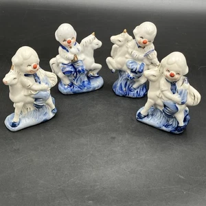 RARE SET OF FOUR Painted Porcelain Clowns on Unicorns. - Picture 1 of 8
