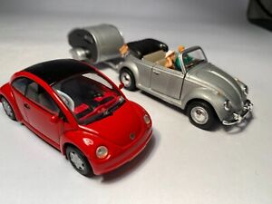 2 VW Beetles, 1970s with Caravan (Cararama) & 1994 Concept Car (Minichamps).