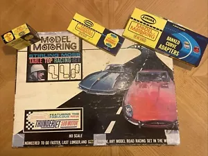 Modelo Aurora 1963 Motoring Stirling Moss Thunderjet 500 juego de coches ranurados con 3 coches - Imagen 1 de 15