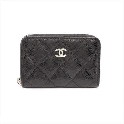 Monedero Chanel Matelasse piel de caviar negro dorado accesorios de metal serie aleatoria Foto 1 de 4
