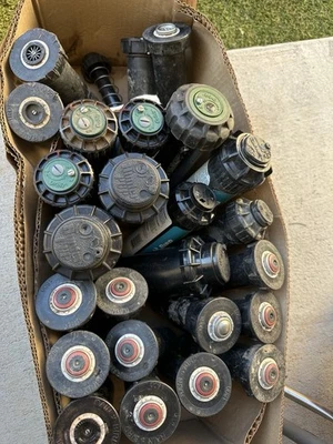 Lot of 25 Rain Bird Hunter Orbit Sprinkler Heads – 21 Working 4 Damaged  - Image 1 of 4