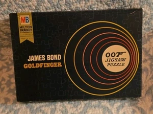 PUZZLE VINTAGE MILTON BRADLEY JAMES BOND 007 GOLDFINGER 5617 - 1965 - Imagen 1 de 1