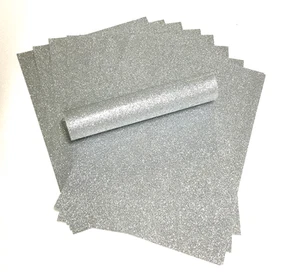 10 A4 SILVER NON SHED SOFT TOUCH GLITTER PAPER, WHITE BACKED APPROX  150GSM  - Picture 1 of 3