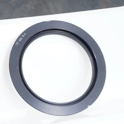 ^ LEE Filters 77mm Filter Retaining Ring Adapter - Image 1 of 2