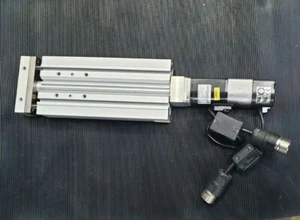 SMC LXPBABD-100S-X21A ACTUATOR W/ OMRON R7M-A10030-BS1-D MOTOR  (IN21S2) - Picture 1 of 3