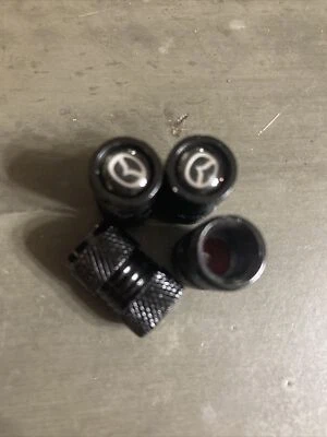 Black Tire Wheel Stem Air Valve CAPS For Mazda - Image 1 of 2