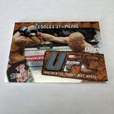 2010 Topps UFC Main Event - 15/88 Fight Mat Relics Georges St-Pierre #FMR-GSP  - Image 1 of 4