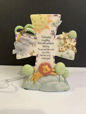 Lámpara decorativa de porcelana Roman Inc cruz animal de colección bebé luz nocturna Foto 1 de 4