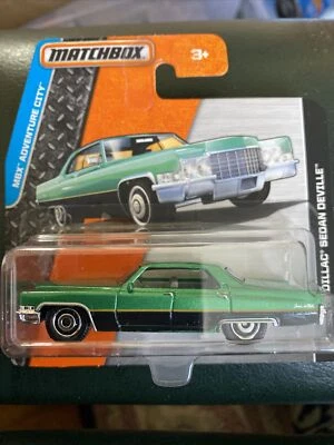 Matchbox 1969 Cadillac Sedan Deville Green Car MBX Adventure City Short Card - Image 1 of 3