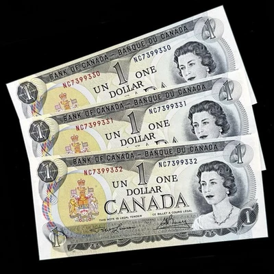 Billetes de un dólar de Canadá 1973 prefijo moneda consecutivo NC lote de 3 AU Foto 1 de 2