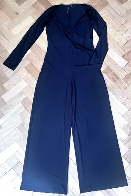 Hermoso mono negro manga larga envolvente sintética Norma Kamali nuevo con etiquetas precio de venta sugerido por el fabricante 195 GBP Foto 1 de 4