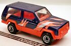Matchbox 1980s/1990s Style Jeep Cherokee 4x4 XJ Purple/Orange 1:58 Scale
