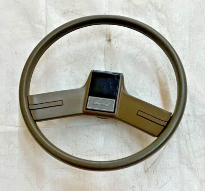 1978-1987 Chevy Tan G Body Steering Wheel Horn Button Trim Monte Carlo Malibu  - Image 1 of 4