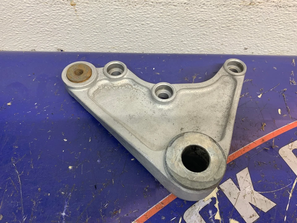 OEM Kawasaki Rear Brake Caliper Bracket  Ninja ZX-10  1988-1990   43034-1090-CE - Image 1 of 1