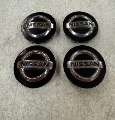 JUEGO DE 4 TAPAS CENTRALES DE RUEDA NEGRAS PARA NISSAN ROGUE SENTRA PATHFINDER OEM 40342-JF50A Foto 1 de 2
