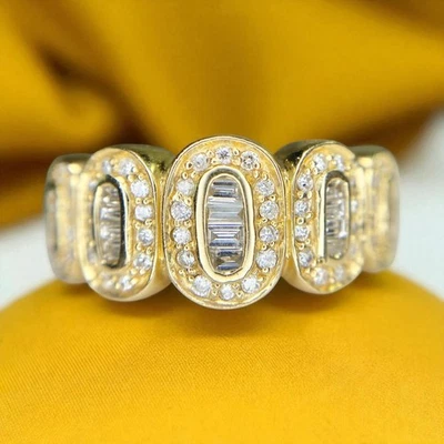 Anillo Effy de oro amarillo de 14k ovalado baguette y diamante redondo Foto 1 de 4
