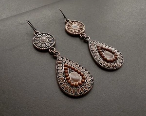 Franceska’s Stamped Teardrop earrings with light brown details 2” - Picture 1 of 4