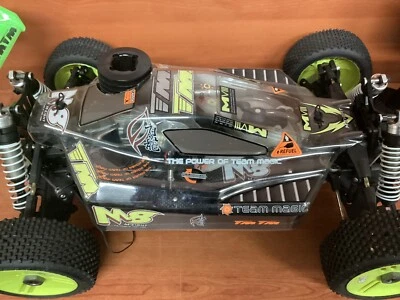 Team Magic Buggy 1/8  a Scoppio( prodotto Da Vetrina ) Completa Di Radio - Immagine 1 di 4