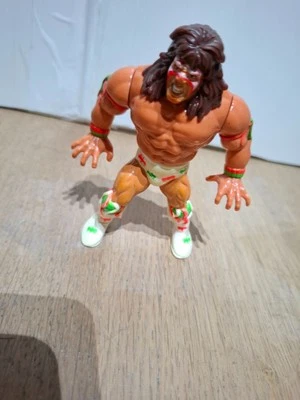 WWF Wrestling ULTIMATE WARRIOR HASBRO Titan Sports VINTAGE anni '90 MOSSA OK - Immagine 1 di 4