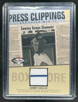 2003 Fleer Box Score Sammy Sosa Press Clippings Game Used Jersey #SS-PC Cubs - Image 1 of 2