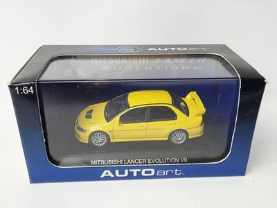 AUTOART MITSUBISHI LANCER EVOLUTION VII AMARILLO ESCALA 1/64 COMO NUEVO EN CAJA Foto 1 de 4